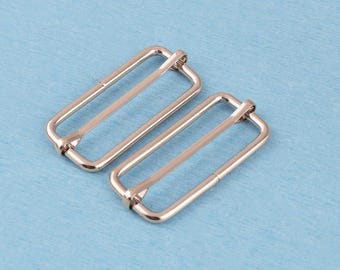 Hebilla deslizante de metal plateado: Hebilla ajustable de tres vías de 2" para correas de bolsos.