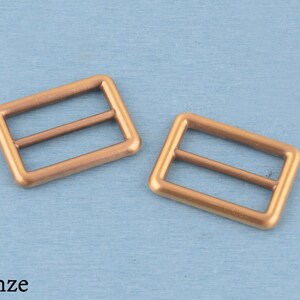 4 st metallspänne med trippelglidning: 32 mm väskremsjustering Brons