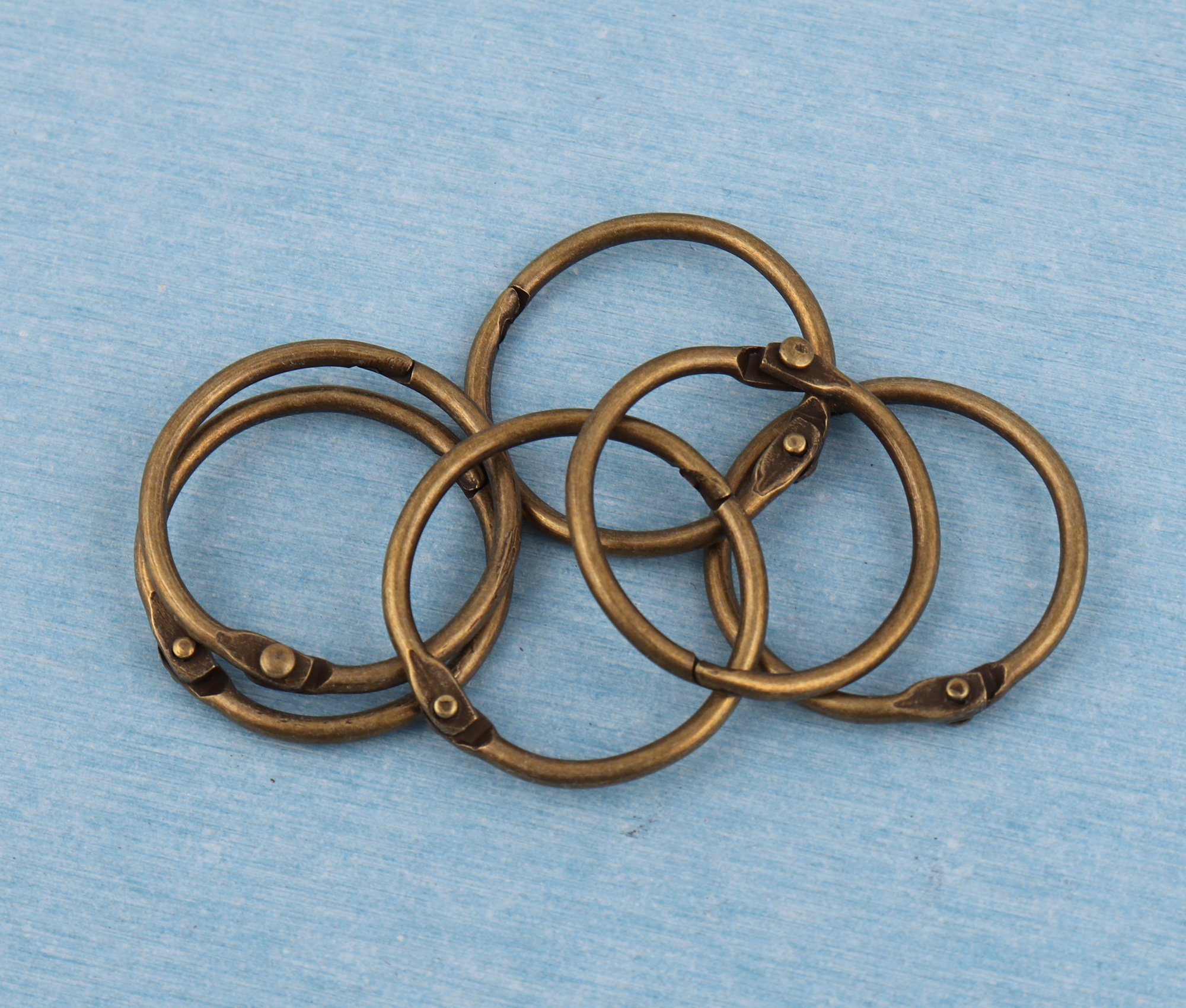 Set anillas de encuadernación bronce