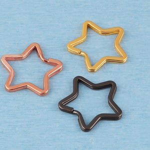 Llaveros con forma de estrella pentagonal: Anillas metálicas para llavero (10-20 unidades)
