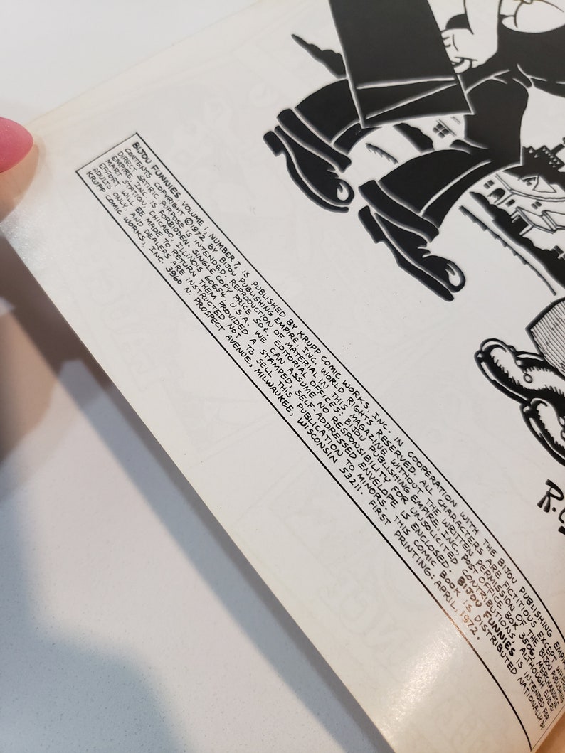 Puede incluir: Un c&oacute;mic vintage, "Bijou Funnies, Volumen 1, N&uacute;mero 7," de abril de 1972. La portada presenta una ilustraci&oacute;n en blanco y negro de una figura en movimiento. El texto incluye informaci&oacute;n de publicaci&oacute;n y detalles de derechos de autor.