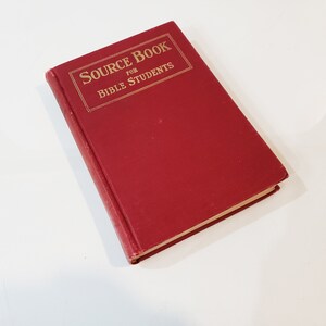 May include: A red hardcover book with the title "Source Book for Bible Students" in gold lettering.