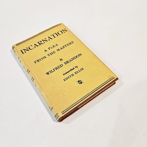 May include: A yellow book titled "Incarnation: A Plea From The Masters" by Wilfred Brandon, transcribed by Edith Ellis.