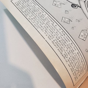 May include: An open comic book page with black and white illustrations and text. The text includes the title "Bijou Funnies" and the publisher's information. The artwork features a cartoon character with an airplane.