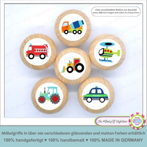 May include: Set of six wooden knobs featuring colourful illustrations of vehicles, including a fire engine, a helicopter, a tractor, a cement mixer, a police car, and a farm tractor. The knobs are ideal for adding a playful touch to furniture.