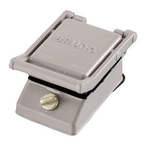 May include: A compact, light gray BRUNO branded sandwich press with a rectangular hinged lid and a single circular control knob on the front base. The appliance features a smooth, matte finish and a black interior rim visible between the top and bottom sections.