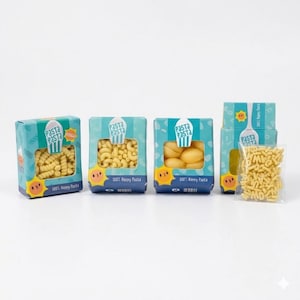 May include: An assortment of pasta boxes and a bag of alphabet pasta. The boxes are teal with a pasta logo and the words "Pasta Pasta" and "100% Happy Pasta." The pasta shapes include rotini, elbow macaroni, shells, and alphabet pasta.