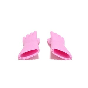 May include: Two pink, miniature hand-shaped objects with a contrasting dark pink interior. The fingers are slightly curved, and the overall design is smooth and rounded. The objects are set against a plain white background.