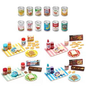 May include: A collection of miniature toy food items including twelve metal cans with various brand labels, four striped plastic serving trays, assorted jars of spreads, small boxes of crackers, plastic slices of cheese, and small plates with toast.