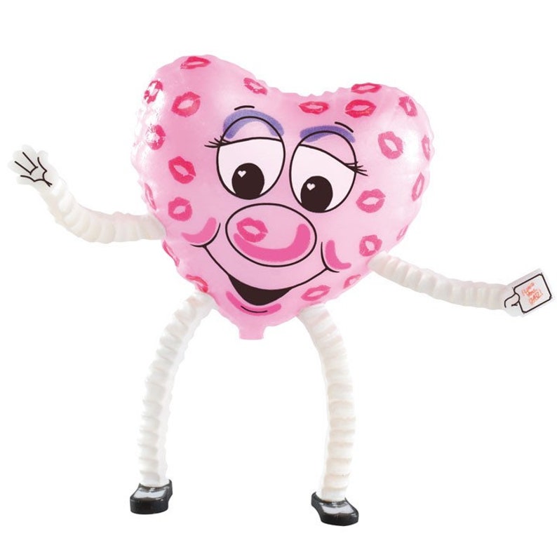 Pode incluir: Um bal&atilde;o rosa em forma de cora&ccedil;&atilde;o com um rosto sorridente e pernas brancas. O bal&atilde;o &eacute; coberto de l&aacute;bios rosas e tem uma etiqueta que diz "Feliz Dia dos Namorados".