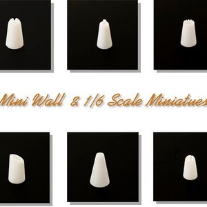 May include: A collection of six white miniature architectural elements, each with a unique shape, displayed against a black background. The text "Mini Wall & 1/6 Scale Miniatures" is in the center. These pieces are likely for model building or dollhouses.