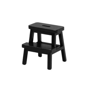 May include: A black wooden step stool with two steps. The stool is made of solid wood and has a simple design.
