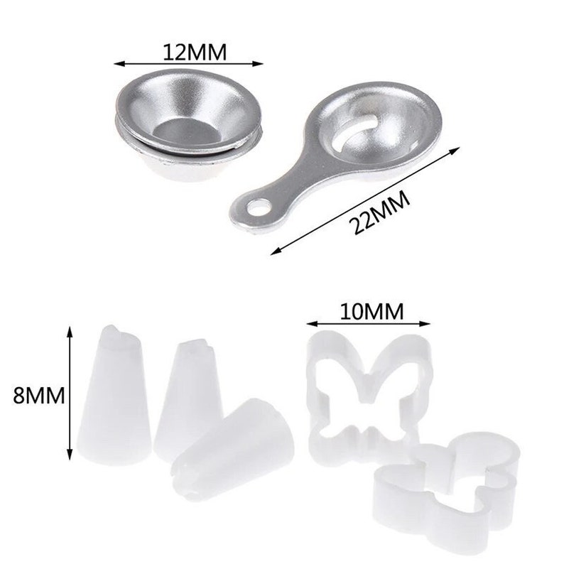 May include: A collection of baking tools, including a small metal bowl (12mm), a metal egg separator (22mm), white piping tips (8mm), and two white cookie cutters (10mm) in a butterfly and Mickey Mouse shape.