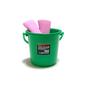 May include: A green plastic bucket with two handles, containing two pink items. The bucket has a label with Japanese text. The items inside appear to be cleaning tools or accessories.