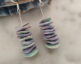 Earring with silver hook, blue, green and purple.