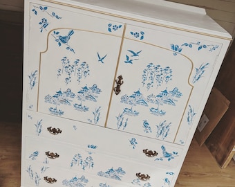 Hand stencilled willow pattern on TV style cabinet with draws