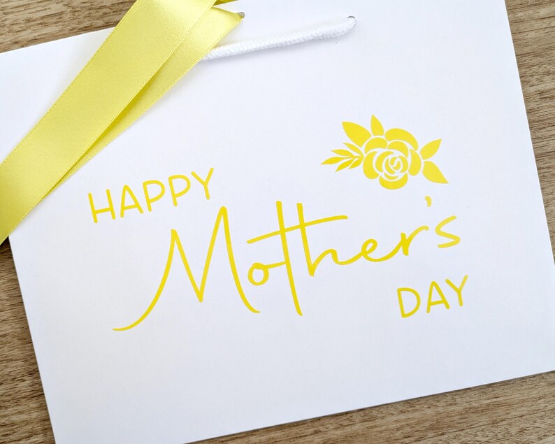 Gift bag with brimstone yellow text and lemon ribbon.