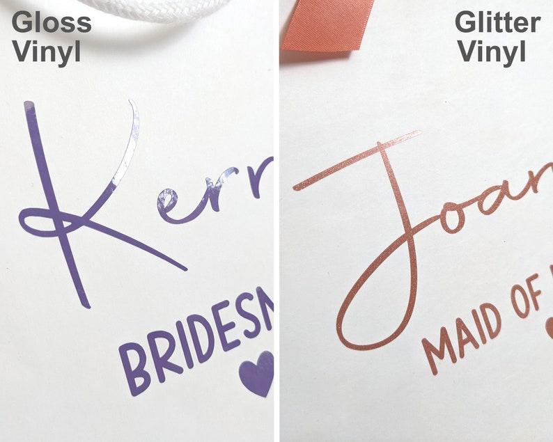 Two gift bags with personalised names, one with purple glossy vinyl, and the other with rose gold glitter vinyl.