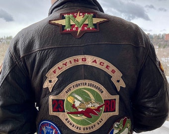 1980s leather bomber jacket in nice condition.  Collectible Mickey Mouse Flying Aces.  Size M.