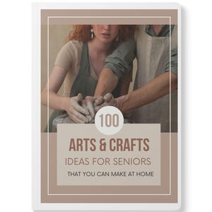 May include: A book cover with the title "100 Arts & Crafts Ideas for Seniors That You Can Make at Home." The image shows two people working with clay. The background is a neutral beige color with a white border.