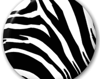 Puede incluir: Patrón de estampado de cebra en blanco y negro.
