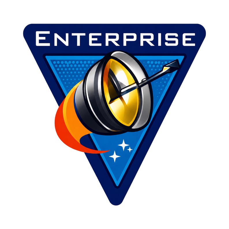 Pode incluir: Um emblema triangular com uma borda azul-escura e um fundo azul-claro pontilhado. A palavra ENTERPRISE est&aacute; impressa em branco no topo. Uma antena parab&oacute;lica cinza met&aacute;lica e amarela com uma cauda de chama vermelha e tr&ecirc;s estrelas brancas.