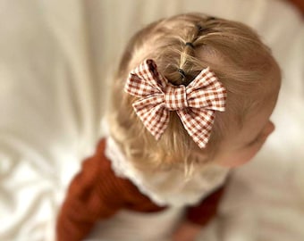 Bow tied on barrette or nylon headband - Double gauze or cotton - Model of your choice