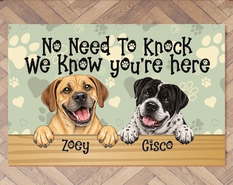 May include: A rectangular doormat with a light green background featuring paw prints and hearts. The mat has the text "No Need To Knock We Know you're here". Two dogs, one tan and one black and white, are pictured below the text. The tan dog's name is Zoey, and the black and white dog's name is Cisco.