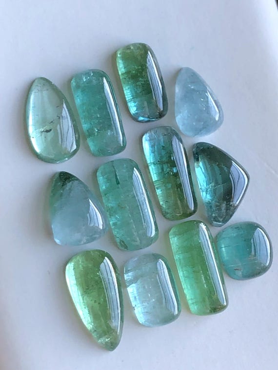 Blue and green tourmaline cabochons lot 50.50 carats