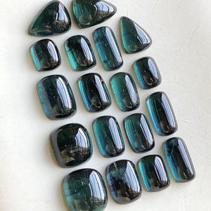 28.80 carats Dark blue tourmaline cabochons lot
