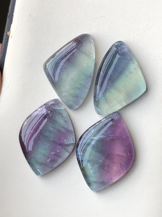 Fluorite pairs cabochons 62.50 carats