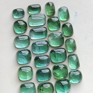 33.20 carats Bluish green tourmaline cabochons lot flat