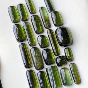 34 carats Dark green tourmaline cabochons lot