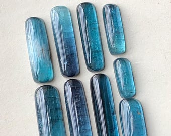 15,50 Karat Blauer Turmalin Cabochons Lot flach zurück