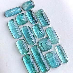26.30 carats Blue tourmaline cabochons lot flat back