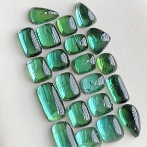 27.50 carats Bluish green tourmaline cabochons lot flat back