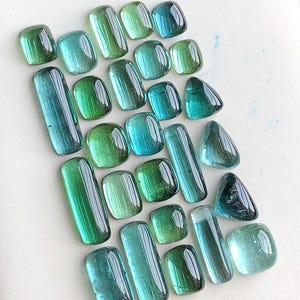 32.90 carats Bluish green tourmaline cabochons flat back