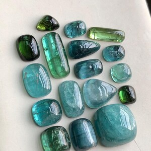 40.50 carats Bright blue and green tourmaline cabochons lot flat back