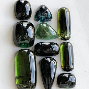44.80 carats Dark green tourmaline cabochons lot