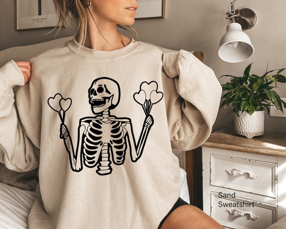 sweatshirt with skeletons