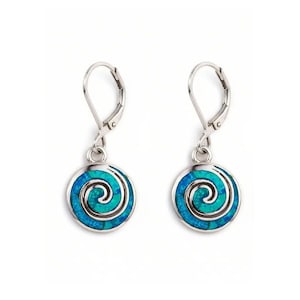 May include: A pair of silver-tone leverback earrings. Each earring features a round, turquoise and teal spiral design set within a silver frame. The earrings are displayed against a white background.