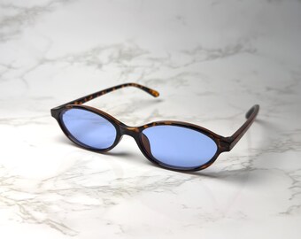 Leopardenmuster-Sonnenbrille, oval, blaue Gläser, Y2K-Retro-Stil, schmale Vintage-Sonnenbrille, Schildpatt-Gestell, 90er-Jahre-Streetwear-Mode, Unisex-Cat-Eye-Sonnenbrille