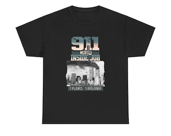 May include: Black t-shirt with a graphic design. The design includes the text "9.11 was an INSIDE JOB" above an illustration of the Twin Towers with the text "2 PLANES 3 BUILDINGS" below.
