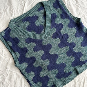 squiggly vest pattern, masc knitting pattern, boxy knitted vest, intarsia, colourwork, made in the moment, luna wear patterns, v neckline, twisted rib edges, green, navy