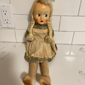 Vintage- Circa 1950’s -70 year old doll Celluloid Face Dutch Girl-blonde Hair-braids-blue Eyes-16” Tall-vintage doll-collectors doll-
