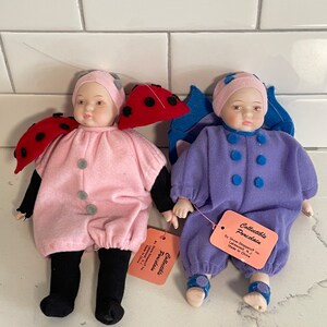 Set of 2-collectible porcelain show stoppers Dolls-Ladybug and butterfly