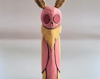 Hand Carved Rosy Maple Mothman