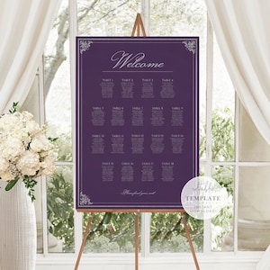 May include: Purple wedding seating chart printable template with a decorative border and the word "Welcome" at the top. The chart is displayed on an easel.