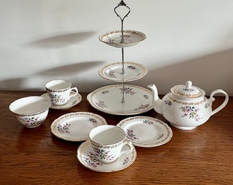 Teapot, Three Tier Cake Stand, sugar bowl, tea plates and cups and saucers, royal grafton