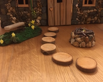 Six Fairy wooden stepping stones handmade  plus a free wooden fairy